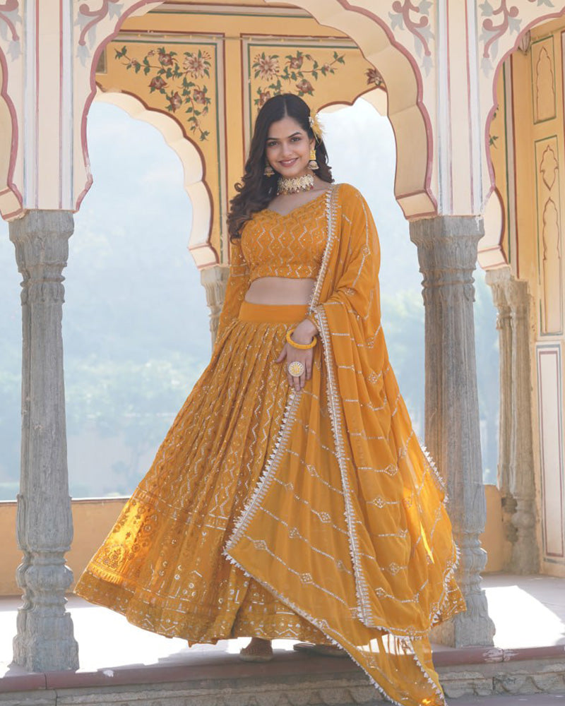 Georgette Heavy Embroidery Threaded Semi Stitched Yellow Lehenga Choli