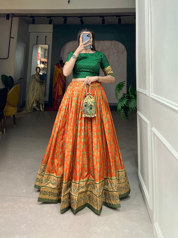 Orange Color Foil Print And Embellish Stone Work Dola Silk Co-ord Set Lehenga